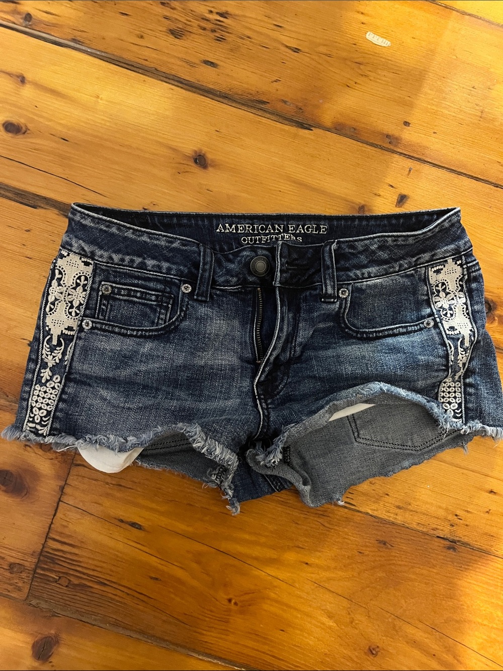 American Eagle Dark Wash Denim Cutoff Shorts with Embroidered Sides